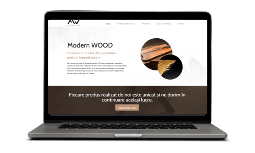 Ecran laptop afișând site Modern WOOD