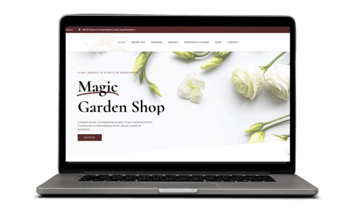 Laptop deschis la pagina magazinului Magic Garden Shop